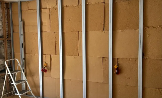 isolation des doublages et travaux de plâtrerie pour les murs d'une chambre